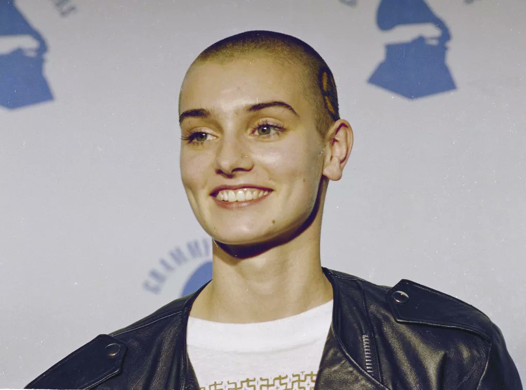iammisstrees's tweet photo. Almost every pic I've seen in obituaries is of her looking serious or sad, but she had a beautiful smile. She was incredible. She fought for others, and we should have protected her dearly. Thank you, Sinéad O'Connor, for your beautiful voice and fierce spirit. Rest in peace 🤍🤍 https://t.co/M49j6guDTF
