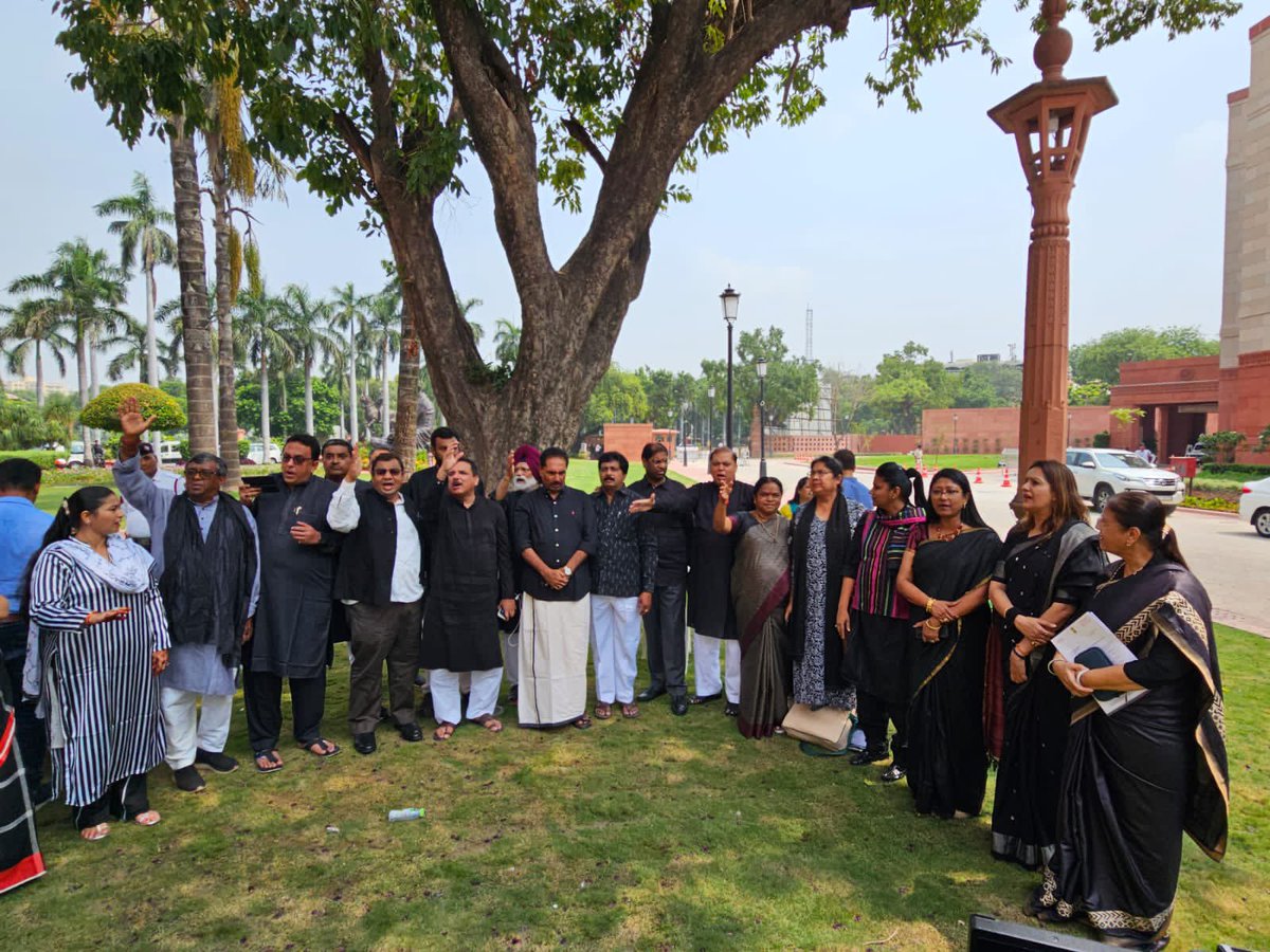 AITCofficial's tweet photo. Protesting against the ongoing Manipur violence, all INDIA MPs in the Parliament wore an all-black attire.

While PM @narendramodi remains occupied with inaugurations and perception management, the entire opposition stands united.

Our thoughts and prayers are with Manipur and we will continue to fight against the tyrannical regime of @BJP4India.

Prime Minister, you must break your SILENCE!