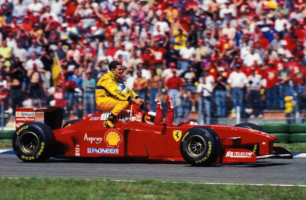 #OnThisDay in ’97 Berger won the #GermanGP, his & Benetton’s last #F1 GP wins. Pic: in his first full F1 season Fisichella qualified his Jordan in P2, but retired 4 laps from the end (puncture); 2nd-placed Schumi (Ferrari) stopped & gave him a lift back to the pits at the end.