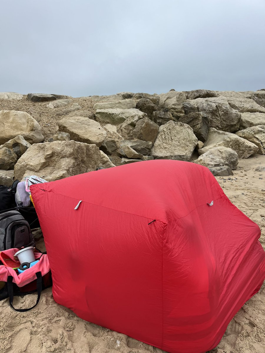 RodwellSam's tweet image. It’s the turn of the 3 year olds at the beach. The Bothy bag had its first outing - shelter from the wind while we demolish a packet of biscuits!