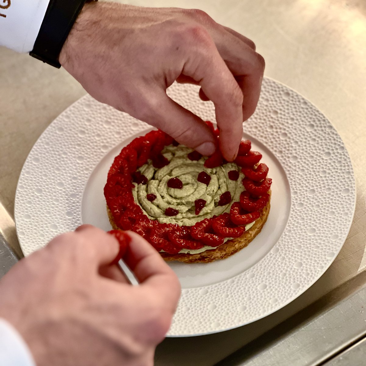 LeComptoirLDN's tweet photo. Putting the final touches to La Tarte Aux Framboises with puff pastry, pistachio pastry cream, raspberry marmalade, pistachio ice-cream https://t.co/nN0XAp1fI7