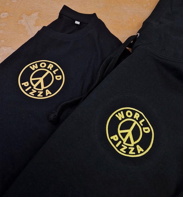 Recent embroidered #uniform for the fantastic eatery which is World Pizza, #Plymouth.  We love the logo! And the pizzas! #embroidery #uniforms #workwear #devon #cornwall