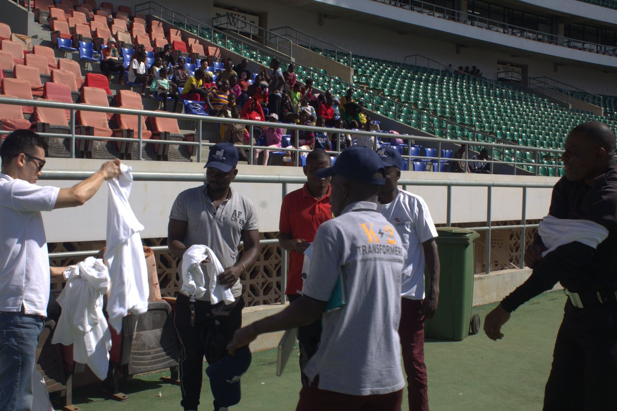 K2 transformers handing out branded outfit to parathletes at the Malawi Paragames at the  Bingu National  Stadium  in Lilongwe. #Supportinclusion