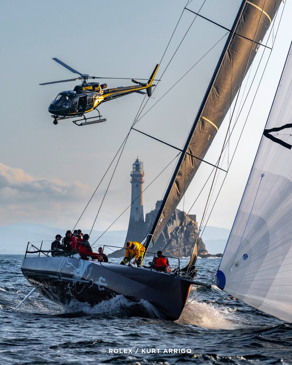 RORCRacing's tweet photo. Ino Noir boldly navigates away from the Fastnet Rock ♥️ An incredible shot by Kurt Arrigo. 📸

#RolexFastnetRace #InoNoir #IRCrating #FastnetRock  
©️ ROLEX | Kurt Arrigo https://t.co/yd6IItpvii