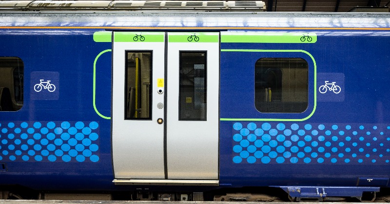 ScotRail's tweet photo. Following customer feedback, we've made it easier to find the wheelchair and bike spaces on our trains, thanks to a new @ScotGov legacy fund for the @Cyclingworlds. Just look for the green and blue stripes around the train doors.