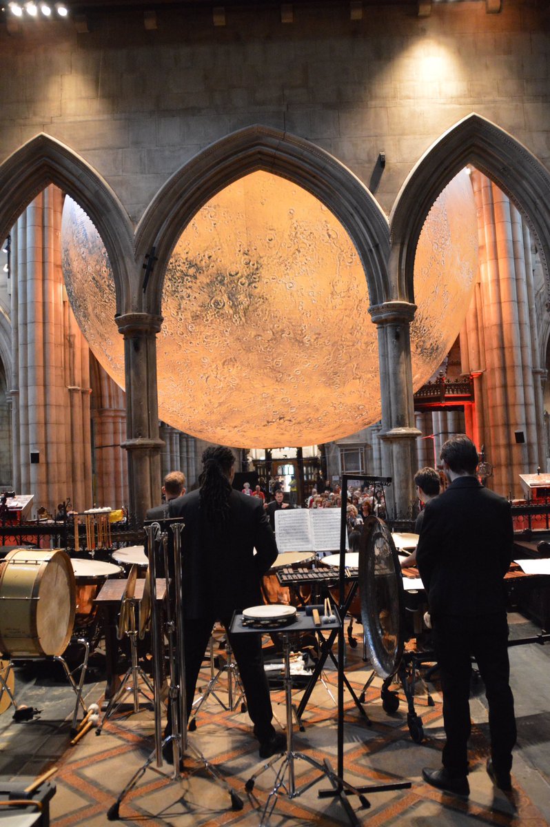 OlsiConductor's tweet photo. What an amazing experience conducting Holst the Planets under a magnificent installation of Mars by @lukejerram with @LondonCityPhil and @kcfestivaluk at @StJohnsW14 @ProfBrianCox #holst
 #mars #jupiter #lukejerram #orchestra #london #mercury #saturn #venus #uranus #neptune https://t.co/T5jntDMECO