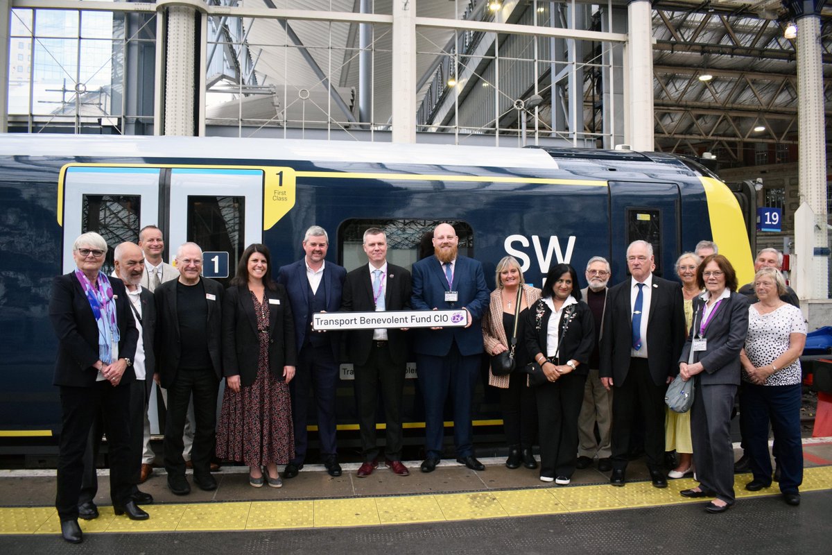 SW_Help's tweet photo. Today we named one of our trains after the Transport Benevolent Fund CIO as it marks 100 years of supporting public transport workers in times of need.

The special event at London Waterloo was attended by our Managing Director, Claire Mann, and representatives from the industry. https://t.co/64mGSTAqwA