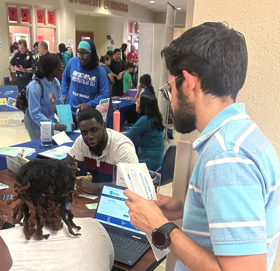 BBCityLibrary's tweet photo. Our Library Team prowled the Congress Community Middle School campus for their Back-to-School Jamboree. We had a great time sharing our resources and upcoming programs. We're pleased to welcome 47 new cardholders from Congress Middle. #BoyntonLibrary #BoyntonBeach #BacktoSchool https://t.co/ocmP3yN5wx