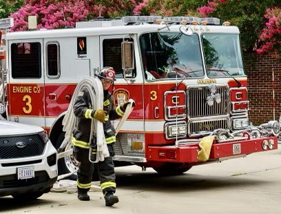 dcfireems's tweet photo. During the course of their probationary period, rookie firefighters are continually tested on their skill sets. Here a probationer from Engine 3 advances a hose line up an aerial ladder. Every day is a training day. #DCsBravest https://t.co/wRK4sP2tXw