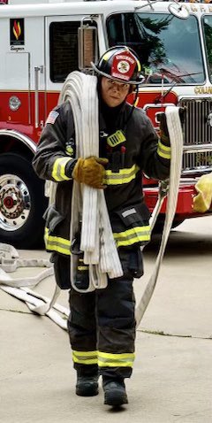 dcfireems's tweet photo. During the course of their probationary period, rookie firefighters are continually tested on their skill sets. Here a probationer from Engine 3 advances a hose line up an aerial ladder. Every day is a training day. #DCsBravest https://t.co/wRK4sP2tXw