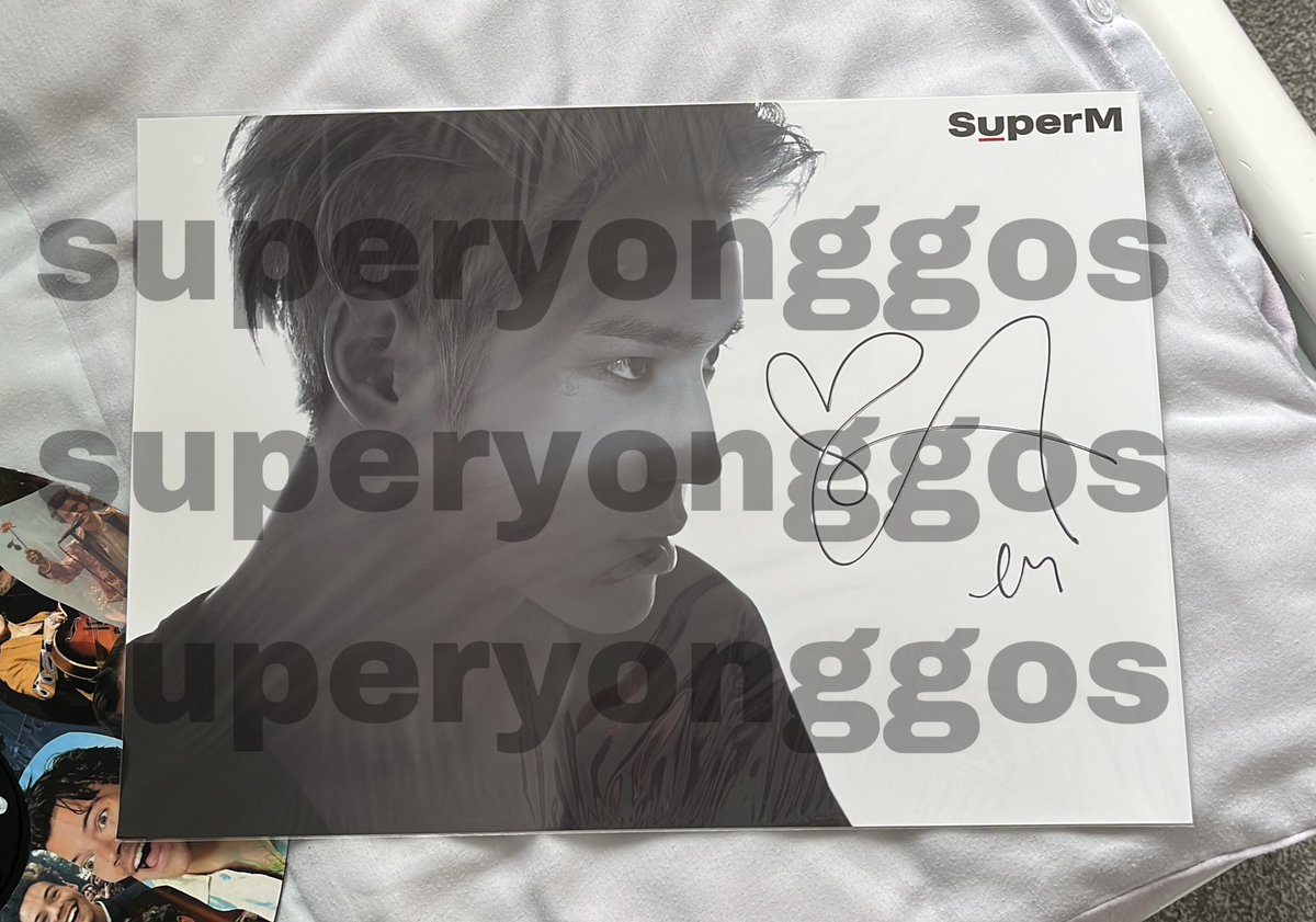 superyonggos's tweet photo. would anyone be interested in buying this superm signed taeyong poster? it’s 100% official, i can send a video of the official sticker to anyone who is interested 🫶 please dm me! https://t.co/tES9rYBLtV