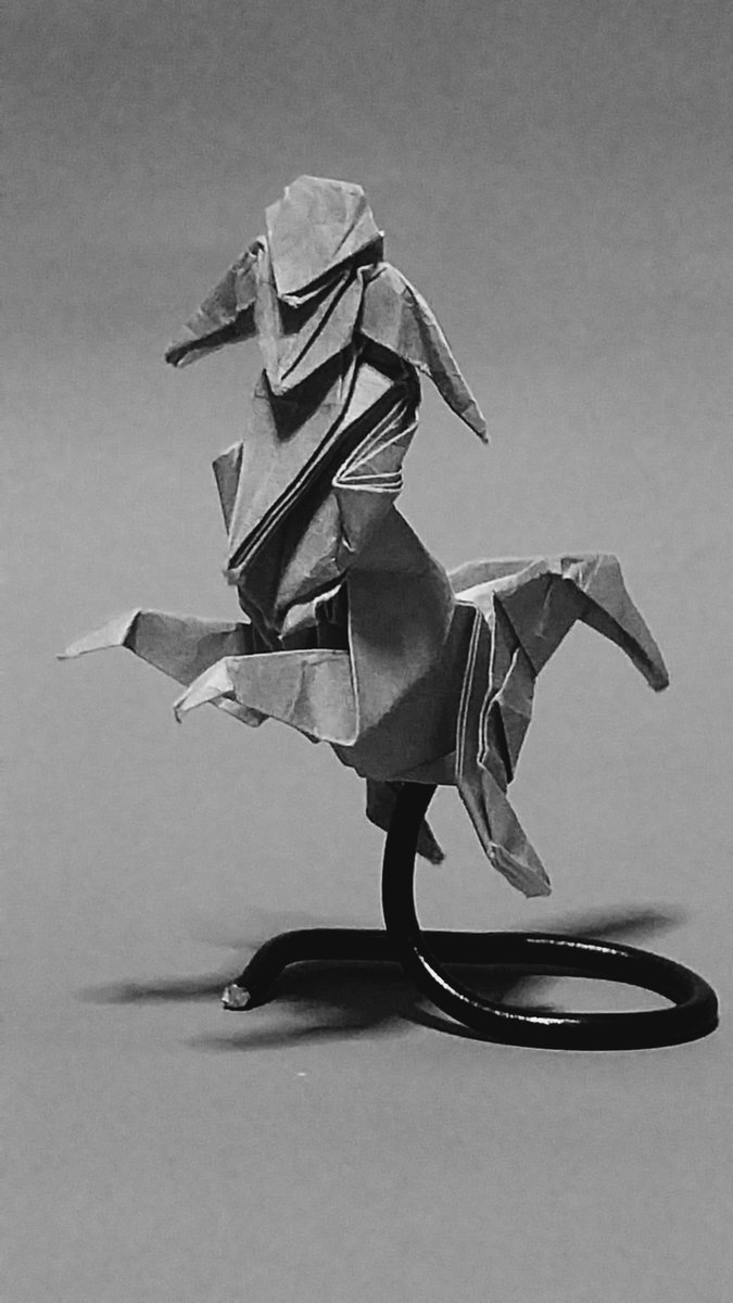 AlphCherno's tweet photo. Centaur
It was hard for me to figure out how to finish it in one try. The original one was made from green kami paper, but I filtered it with greyscale to hide unwanted white points.
Designed &amp; folded: @AlphCherno https://t.co/WvFIVp9MZC
