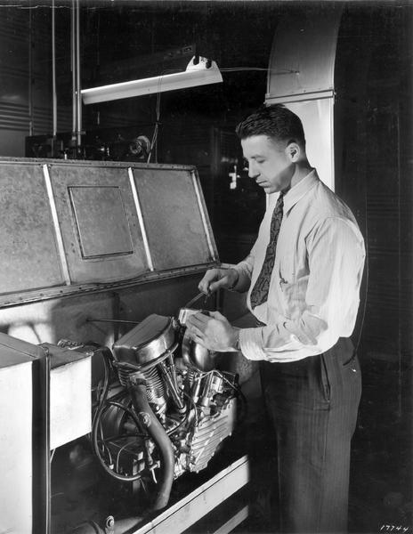 From the archives is a photo from the engine testing department! The engineer added a thermocouple to a Panhead to measure the temperature of incoming air. This determined the right air and fuel mixture for best fuel combustion efficiency. #ArchivesScience #ArchivesHashtagParty