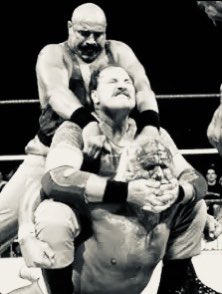 HarryHaris48861's tweet photo. Sgt Slaughter has the camel clutch on Hulk Hogan, with some added leverage from Colonel Mustafa aka The Iron Sheik. #SgtSlaughter #IronSheik #ColonelMustafa #HulkHogan #prowrestling @_SgtSlaughter https://t.co/ZID5L15y8U