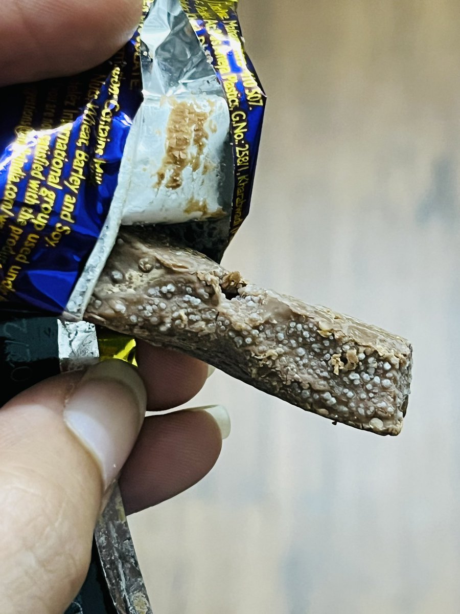 iamasmiii2's tweet photo. @DairyMilkIn WHAT IS THIS!? I brought this pack yesterday, as you can see it’s still within its expiry date, and this is what it looks like, infested? Smells like outdated and something’s that gone bad! The entire packet is same! Don’t buy mini guys, horrible experience https://t.co/mB5S7GHE31