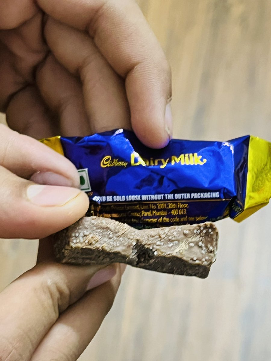 iamasmiii2's tweet photo. @DairyMilkIn WHAT IS THIS!? I brought this pack yesterday, as you can see it’s still within its expiry date, and this is what it looks like, infested? Smells like outdated and something’s that gone bad! The entire packet is same! Don’t buy mini guys, horrible experience https://t.co/mB5S7GHE31