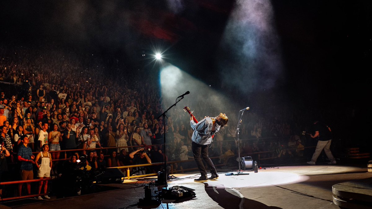 NoahKahan's tweet photo. When I’m old and gray I’ll look back and say “we fuckin did that”. Red rocks, we did that together. I felt like I was with an extended family, rooting me on. I’ll play a lot of shows in my life, not sure how many will top that one. https://t.co/Pcud8JyyWq
