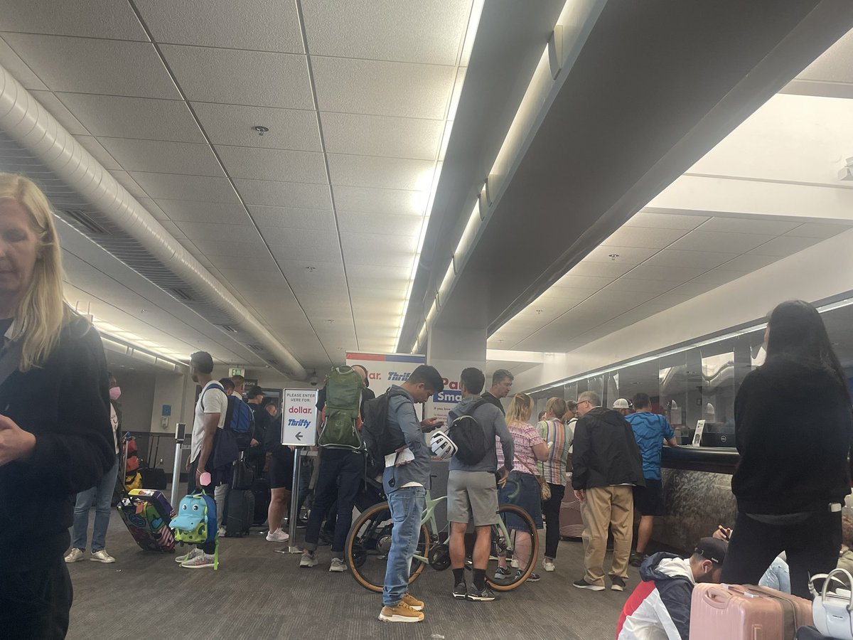 pmdbooth's tweet photo. @DollarCars Already been waiting three hours for a car at San Fran airport Staff saying no cars available  We are on a waiting list despite pre paid booking Shocking service Queue horrendous Never use dollar rental car hire us my advice https://t.co/cKcb2HdNdl