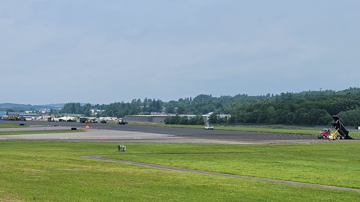 flymanchester's tweet photo. Making progress! 🚧✈️ Our construction and airfield crews are almost done laying the top course of pavement on Runway 17-35. They have 1,500 feet of runway to go! After they finish paving, they will continue installing lights and work on painting the runway markings. #WorkMHT https://t.co/kRiOQBcwRO