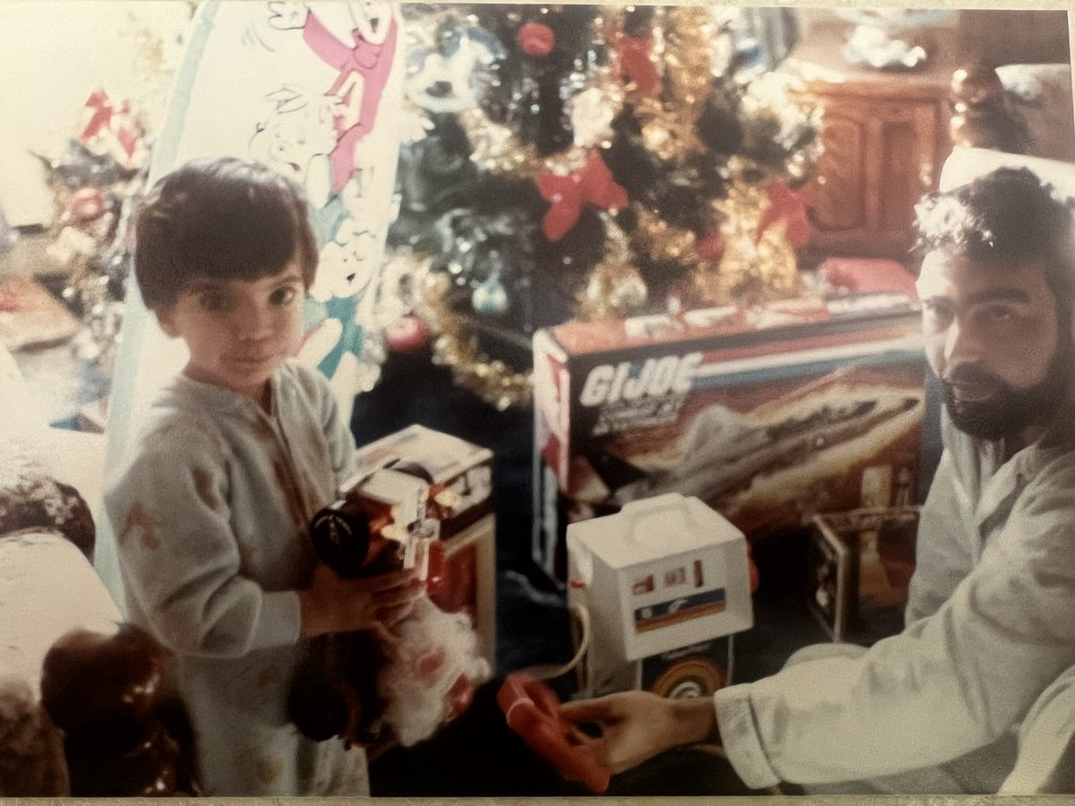 anthony_cinotti's tweet photo. @hasbr0mniverse If you’ll look carefully that’s me and my old man Christmas morning 1984. And look what’s in the background!!! https://t.co/nSKbAn3aPc