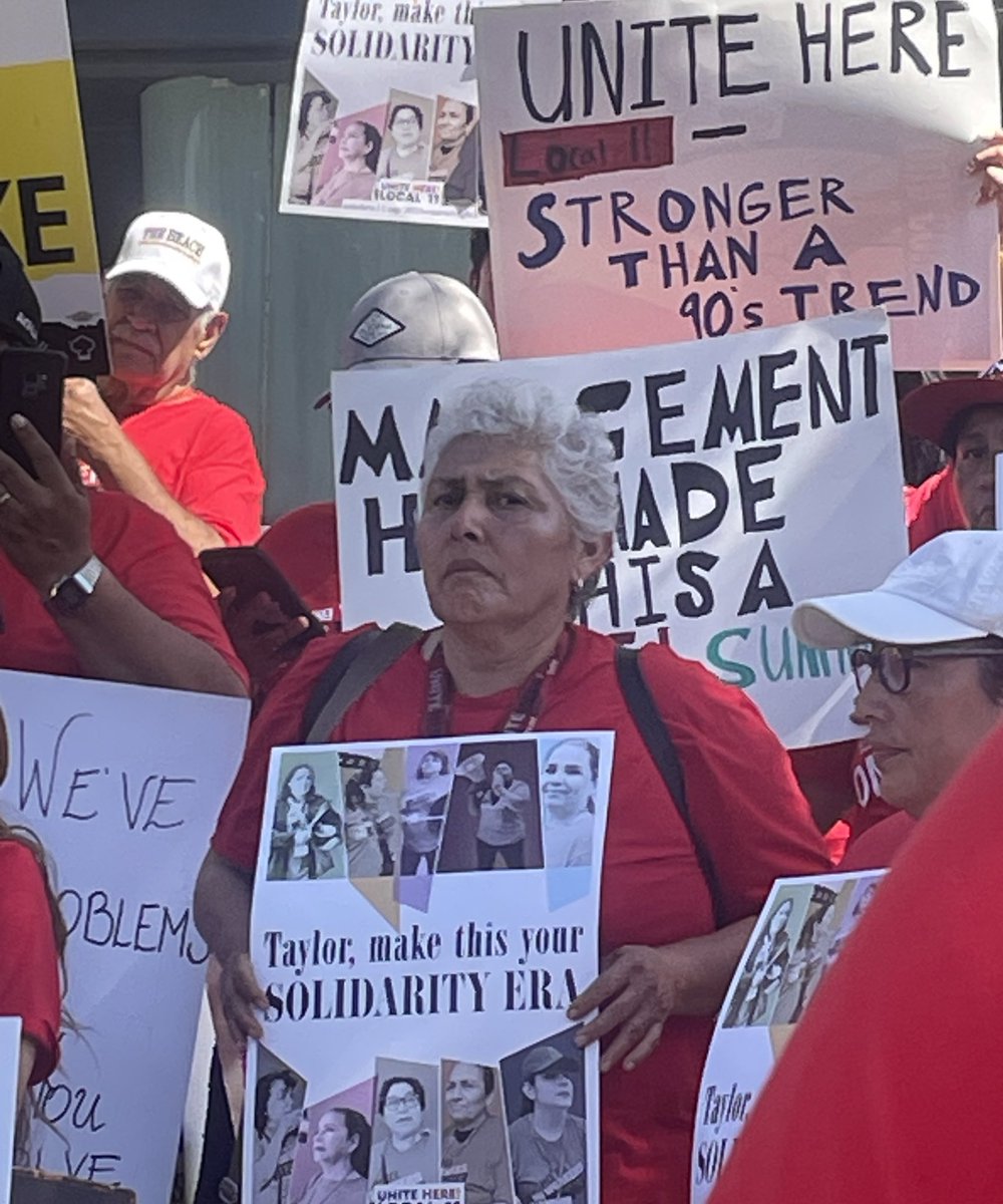 suhaunah's tweet photo. striking hotel workers are urging @taylorswift13 to postpone her LA concerts next week. here are some signs from their protest outside the Hyatt Regency LAX this morning: https://t.co/DRKI8zAbUQ