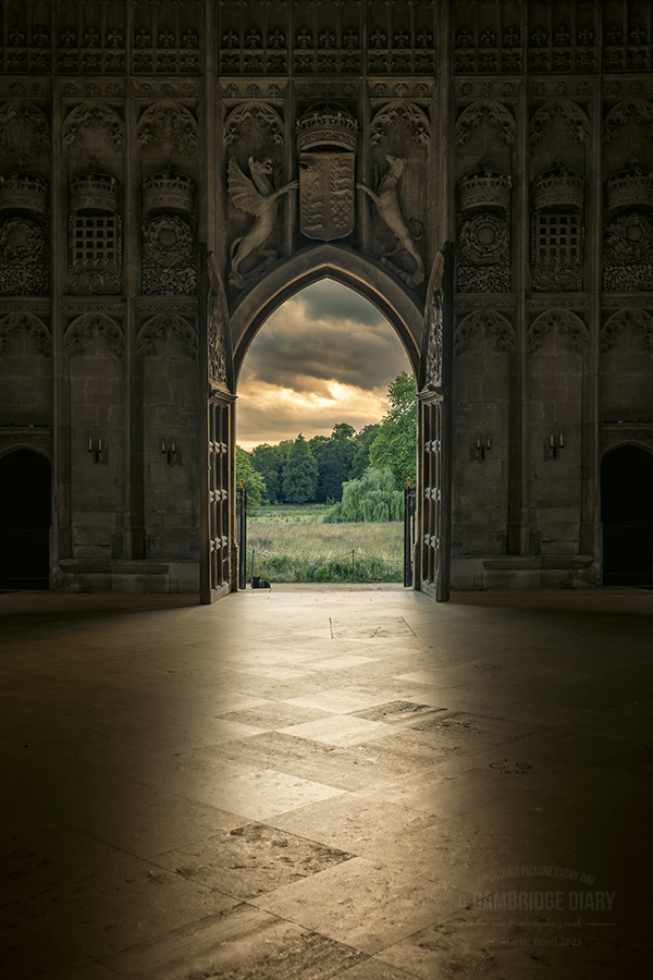 The West Door at King's College Chapel was opened especially for me tonight so I could take this picture of the sunset over the wildflower meadow - which was nice :) and if you look closely you can see the college cat! A picture of Cambridge every day since 2010. (No 4869)