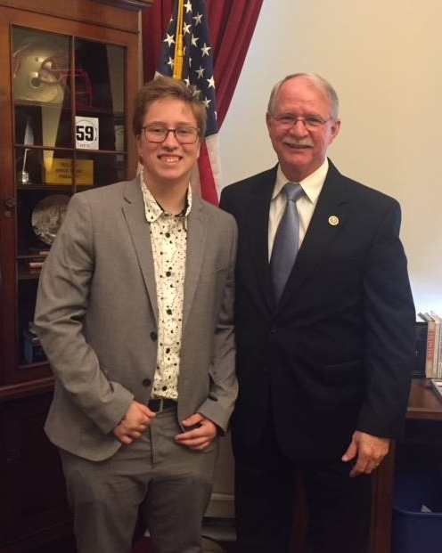 ericak2011's tweet photo. @RepRutherfordFL We do know how great you are with students! Here's you with my son 5 years ago, after you met with us and told him that the Equality Act sounded like something you'd support. Turns out you were lying about that, though - have you told any good lies to your new interns? https://t.co/eNy48jUkgS
