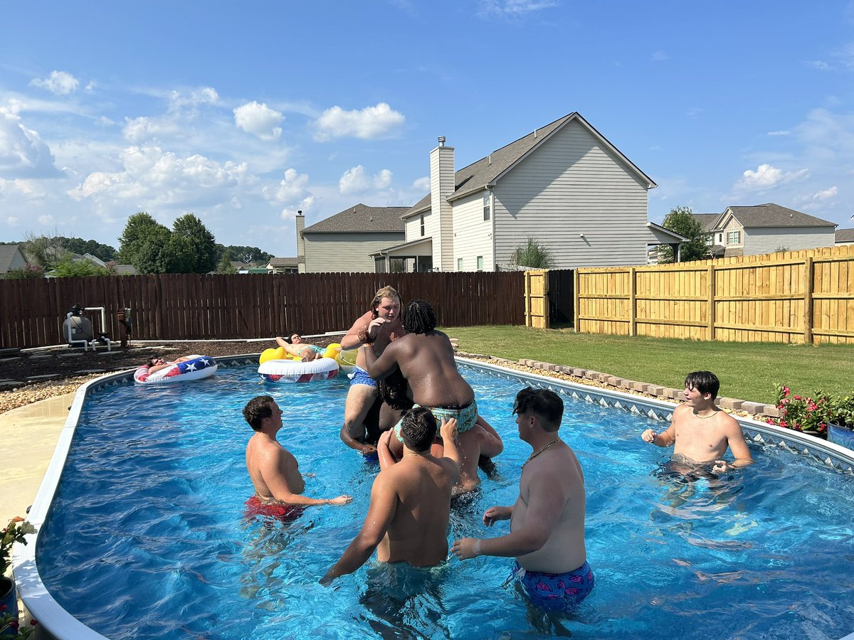 chastain_kelly's tweet photo. HOCO Offensive Line…Brotherhood!! End of summer pool party. #BaddiesAndBellyFlops #BearBEEF 🐻⬇️ https://t.co/CdV7gnvAt7