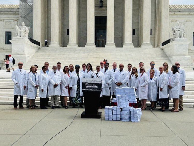 BREAKING: Physicians gathered at the Supreme Court with over 100,000 petition signatures to call for an investigation into Fauci's misleadings and corruption.