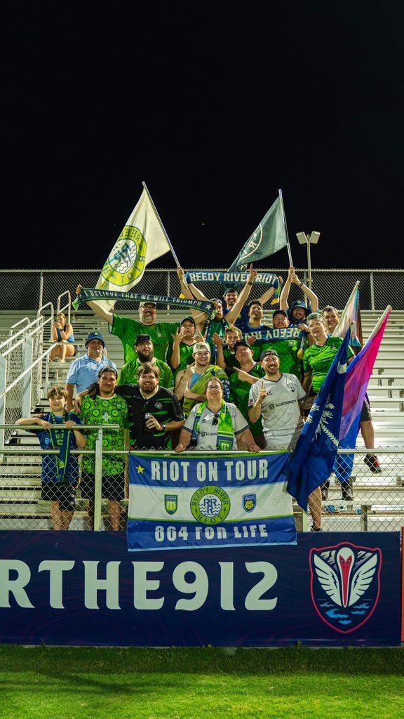 GioCanas10's tweet photo. We love ya and where you go we’ll follow 💚 Our @GVLTriumph bus trip to Statesboro was a success last weekend! I can’t wait to do it again with my Triumph &amp; @GVLRiot family 💙

📸: @chandlerjarrell https://t.co/rfiYHEvINd