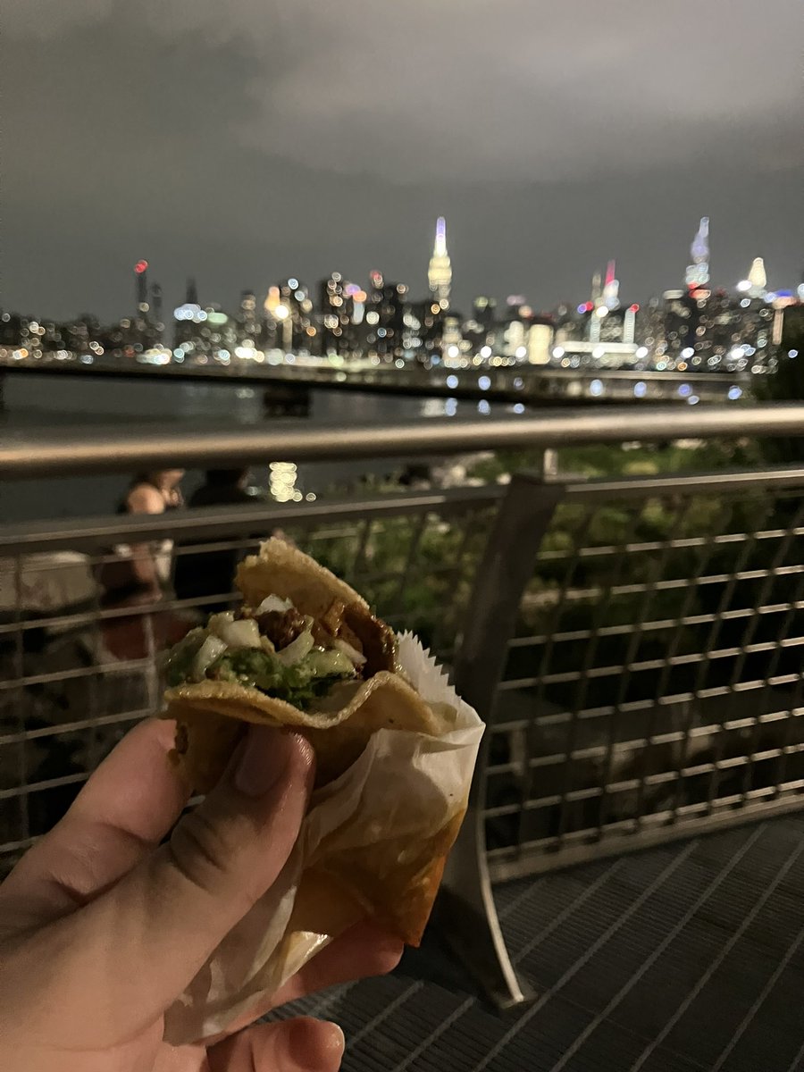 Step 1. Order tacos
Step 2. Order pizza next door
Step 3. Eat pizza while waiting for tacos 
Step 4. Eat tacos in the park with a view