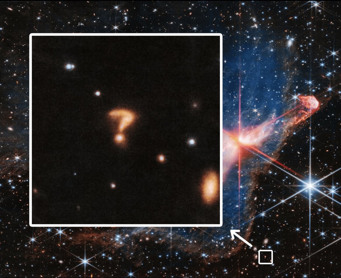 A cosmic question mark, caught by JWST