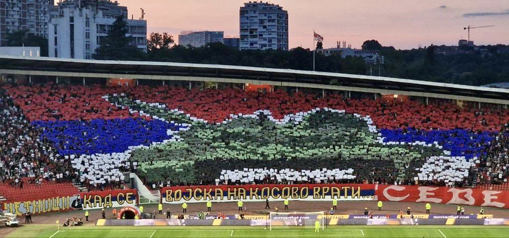 During yesterday’s match vs. Fiorentina, Red Star Belgrade’s “Delije” hold up a massive choreography showing a tank over a Serbian tricolor w/ a banner reading “When the Army Returns to Kosovo”. We ignore the obvious signs of Serbia’s backsliding at our collective peril.