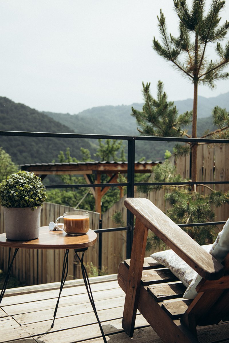 Looking for some content to freshen up your social media platforms? Here's an image for you this Friday that's FREE to use! 💭✨

An image inspiring relaxing weekend feels, just imagine winding down on this beautiful scenic balcony... 🏞

📷 Katie Azi

#FreeToUseFriday #TGIF