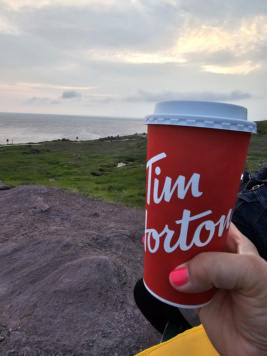 SharonSandink's tweet photo. @TimHortons Cape Spear sunrise with Timmies coffee.  How much more Canadian can you get! https://t.co/oB4EwApSls