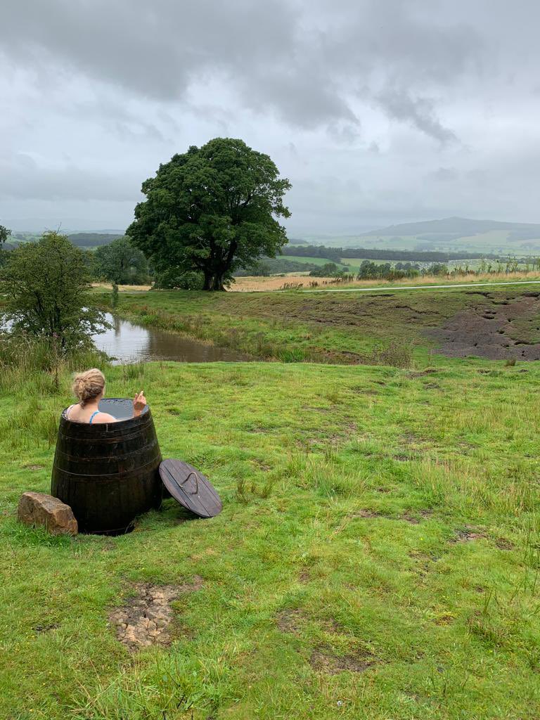 exmoorjane's tweet photo. An ice bath with a view…. At Broughton Sanctuary. And yes, I’m in the one behind her! #icebathing https://t.co/9kC5bMF7Pk