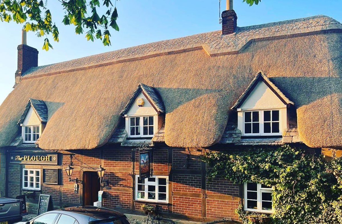 CheltBeerWeek's tweet photo. The Plough Prestbury is everything you could want from a traditional village pub. Beer is served straight from the cask &amp;  it has a fabulous range of ales and cider. It’s a Summer favourite with a 1 acre garden &amp; play equipment. It also boasts a real fire in its cosy tap room. https://t.co/NRcWz70gLS