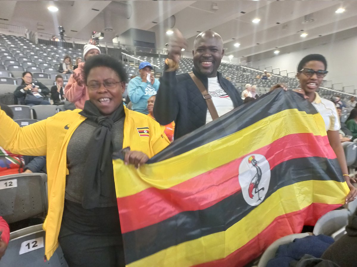 AmoruPaul's tweet photo. Exciting match at the Netball World Cup between Uganda and Singapore! Shecranes are dominating with a comfortable lead. Thrilled to be alongside Hon. Minister Kaducu Joyce, Hon. Kyinyamatama, Gen. Bwekwaso, and the vibrant Ugandan diaspora, celebrating the team's tremendous performance. Go Shecranes, keep making us proud! 🏐🇺🇬 #NetballWorldCup" @BigirwaNorah @UgandaMFA @OgwangOgwang @Educ_SportsUg @UgandaMediaCent