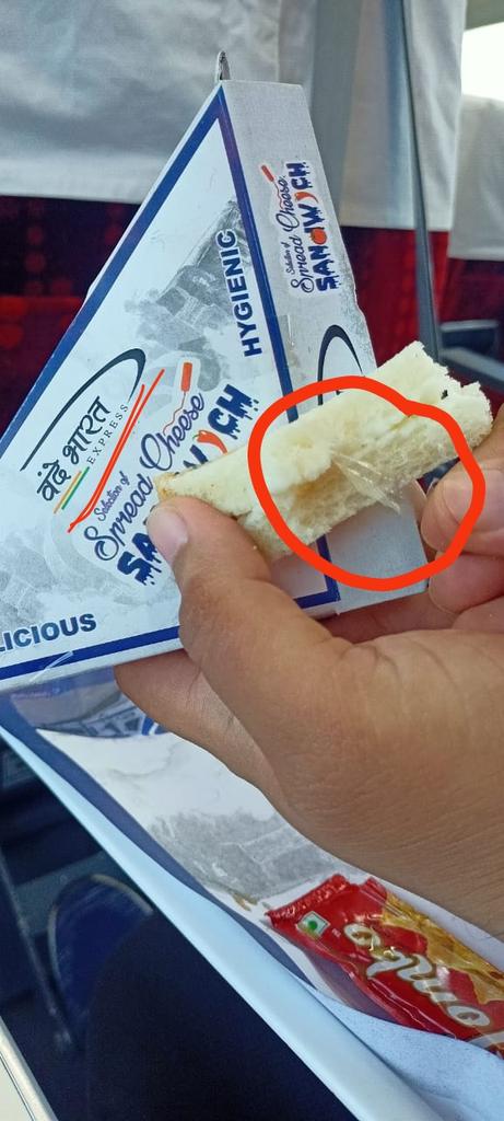 Argha_2001's tweet photo. Today I'm travelling by 22302 HWH VANDE BHARAT EXPRESS from NJP. In Executive Class I have been served a well wrapped cheese sandwich, but there was TORNED PLASTIC pieces inside the sandwich!!!
@RailMinIndia @IRCTCofficial Is it tolerable for such trains with such extreme price? https://t.co/cuBBO4iuHU