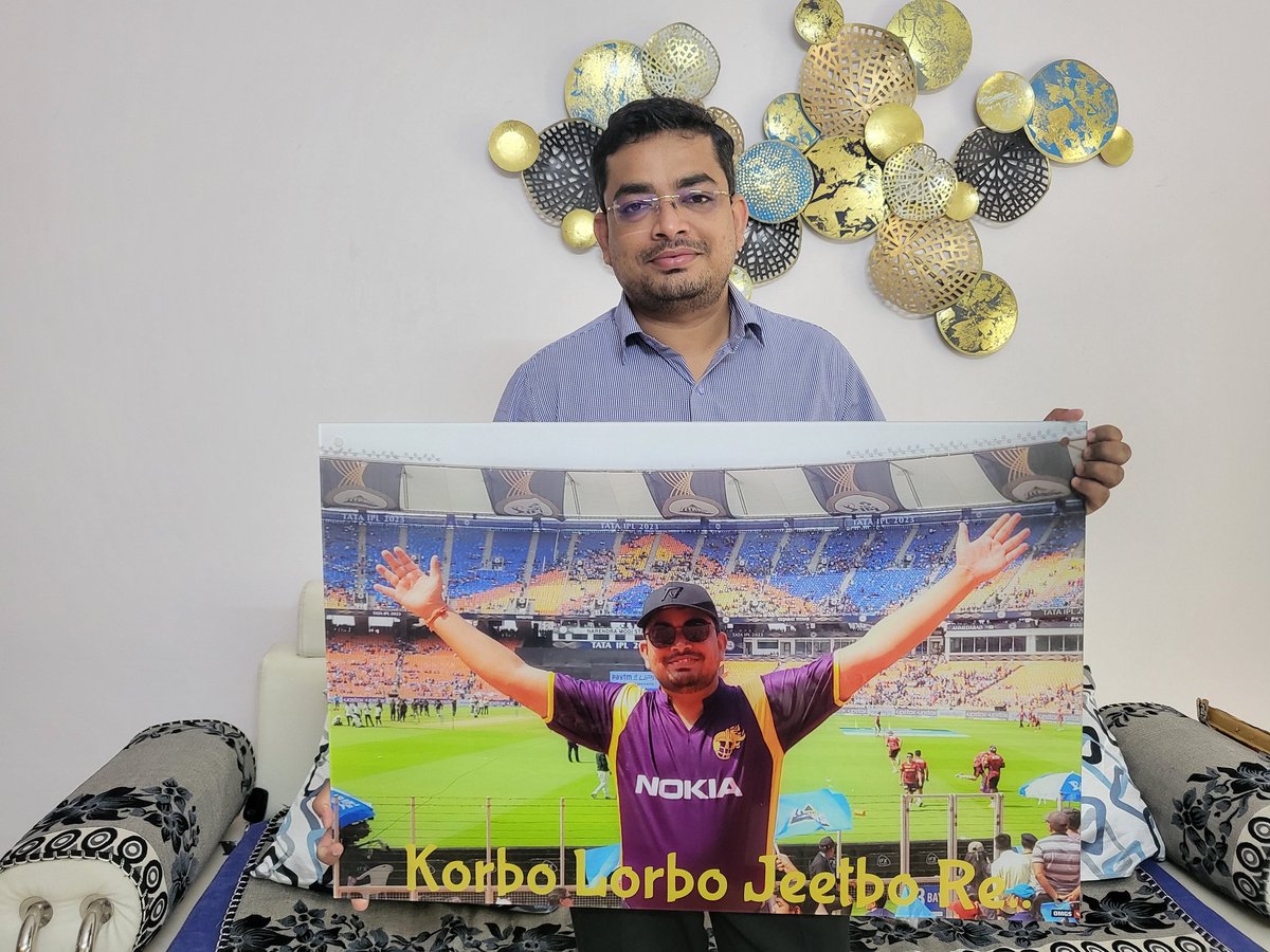drmihir28's tweet photo. When it's your birthday, then what better gift wife can give to crazy #kkr fan than a photo frame to remember the iconic famous finish by @rinkusingh235 where only one was supporting a team in stand which was full of Gujarat Titans fans in Ahmedabad...crazy moments to mesmerize.. https://t.co/C8QKclu2Tk