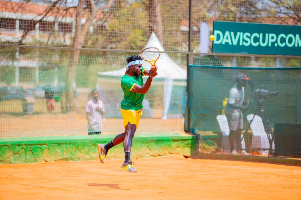 tennis_rwanda's tweet photo. #DavisCupRwanda 

Group IV - Africa - Group A  

Day III, Match II 

Ismael Mzai ( #Kenya) ✅️

6-2 6-4 

Cliford Wuyum Nkwain ( #Cameroon) 

#DavisCup #CIMERWA #AmekiColor #ParkInn #SimbaVoyages #VisitRwanda #Liquid https://t.co/GqzT4tAAcd