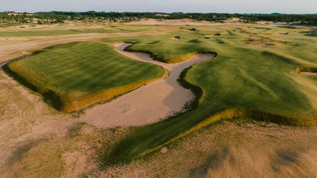 fried_egg_golf's tweet photo. Hole of the Day

The Lido
No. 18 - par 4 - 424 yards

Inspired by Alister MacKenzie's winning design from the Country Life contest in 1914, the "Home" hole at the Lido has multiple fairways separated by a sandy waste area. The left fairway is fairly easy to reach but leaves a long approach. The long-carry options on the right offer the prospect of a kick down through huge, manufactured channels. The green is a chaotic marvel.