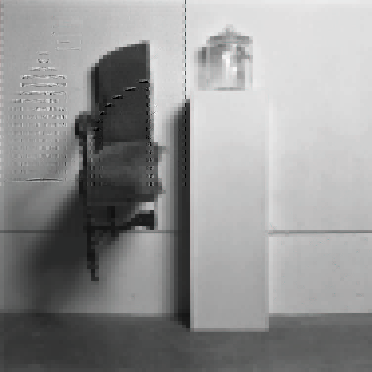 Yoko Ono's Half-An-Armchair, 1967/1971 with John Lennon's Air Bottle, 1967/1971; This Is Not Here exhibition, Everson Museum of Art, Syracuse, New York, 9 – 27 October 1971.