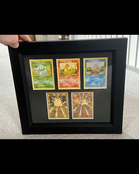 fabled_framing's tweet photo. Golden pikachu and charizard! #tcg #tradingcards #pokemon #pokemoncards #pokemontcg https://t.co/r292Oi89dK