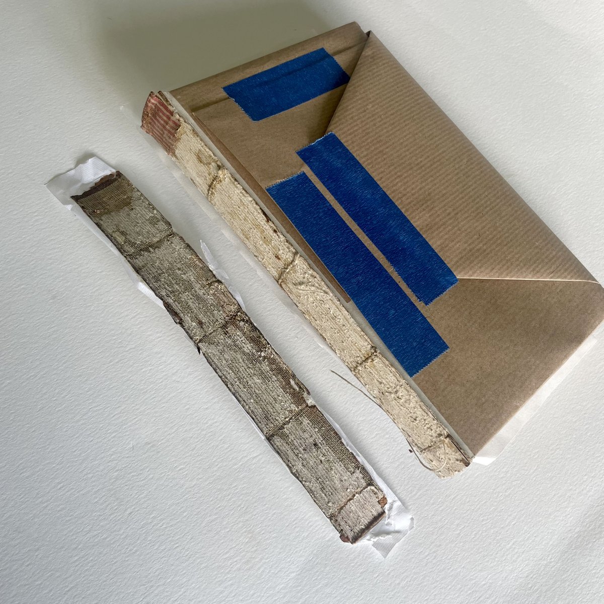 There's a few repair jobs on my bench just now. This one is a tight back binding so the spine removal was a bit more of a challenge – over three hours slowly and carefully teasing it away while keeping it all in one piece.