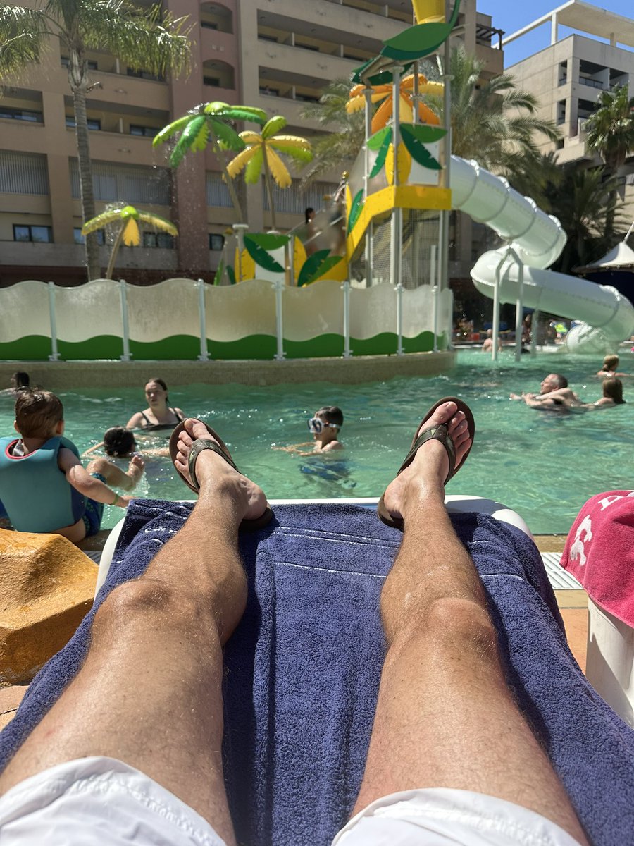 Matt74P's tweet photo. Holiday tan desperately needed.  #Spain  #holiday #tanning #swimmingpool I’ve avoided the gym so far but must get in it tomorrow. https://t.co/80jYjDz9M3