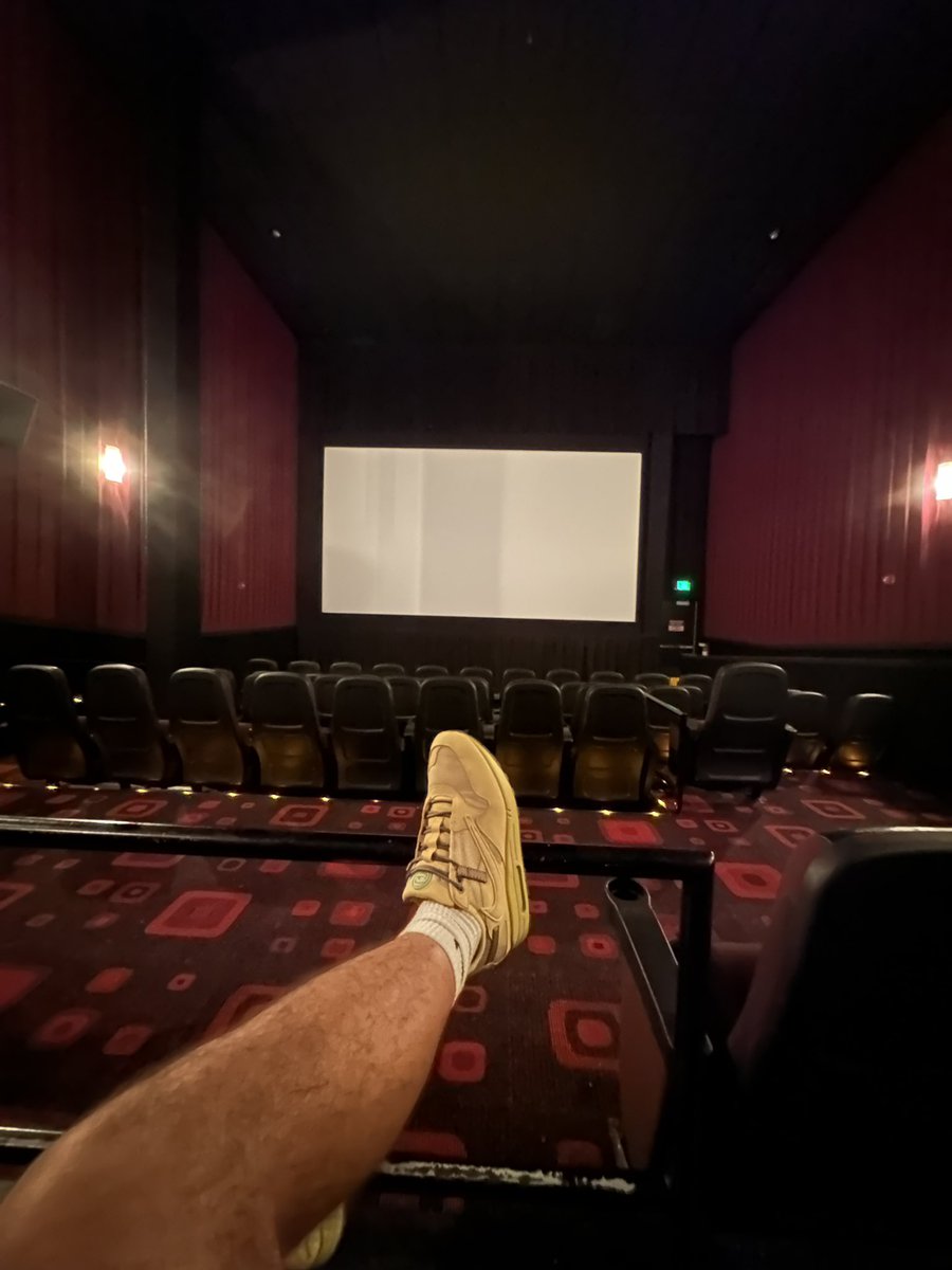 teovazquez10's tweet photo. i asked my mom last night if we could get tickets to see circus maximus, i told her about the shirts she got me the earliest showing. we are the only people here. they didn’t even download the movie yet we have to wait another 30 mins. after showing up 1 hour early. @trvisXX https://t.co/4LEUY3QeAO