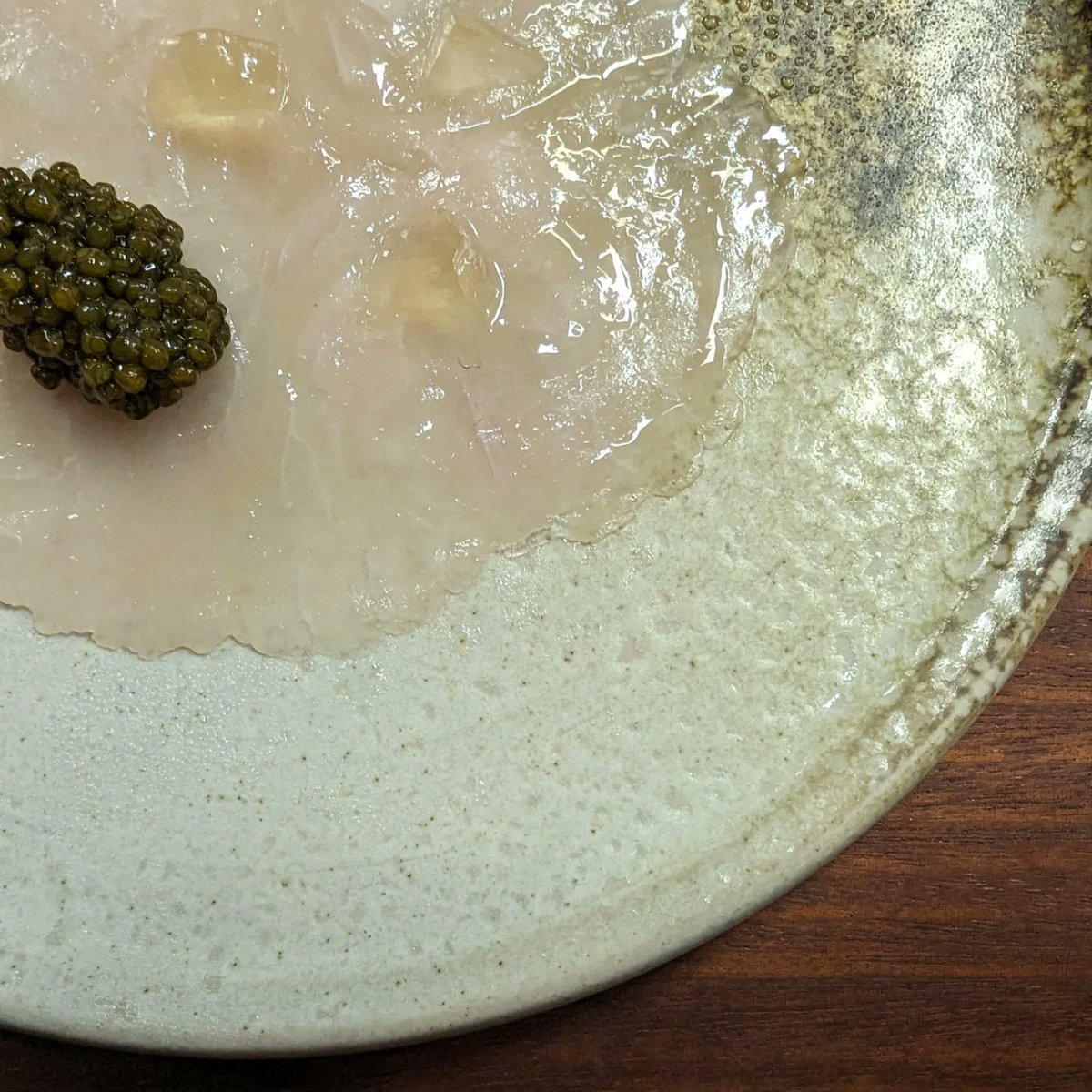 Arctic Char.
We buy the freshwater fish directly from Hans at Houghton Springs. 
We dry age it for 10 days to enhance the flavour and improve the texture of the meat. 
We season it with an oil we make using the smoked bones and finish it with the best of British Exmoor Caviar.