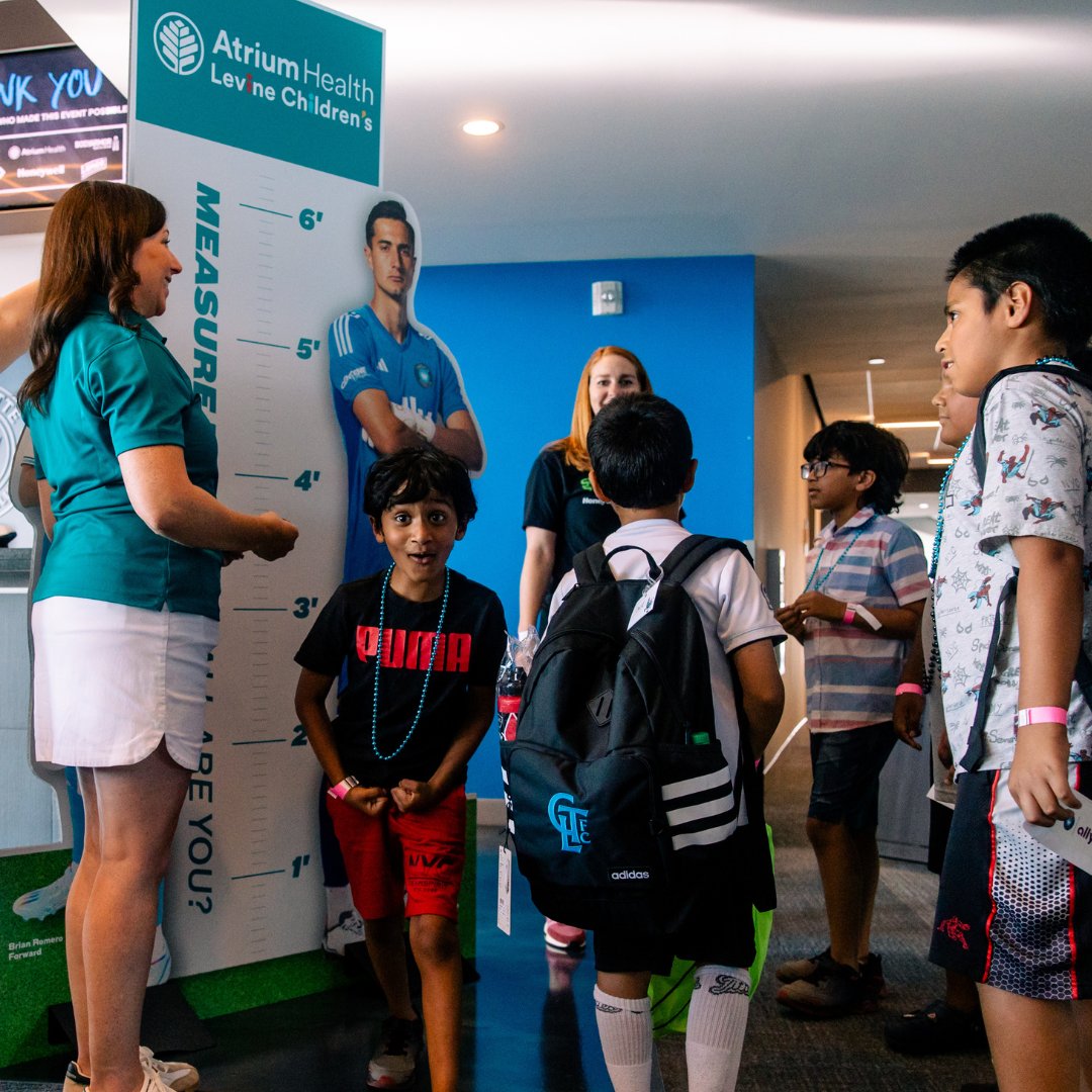 AtriumHealth's tweet photo. We are honored to be part of @CharlotteFC back-to-school event that equipped students and teachers with the supplies to start the school year off on the right foot ⚽🦶 

#AdvocateHealth #BackToSchool https://t.co/N8sNLrDFjE