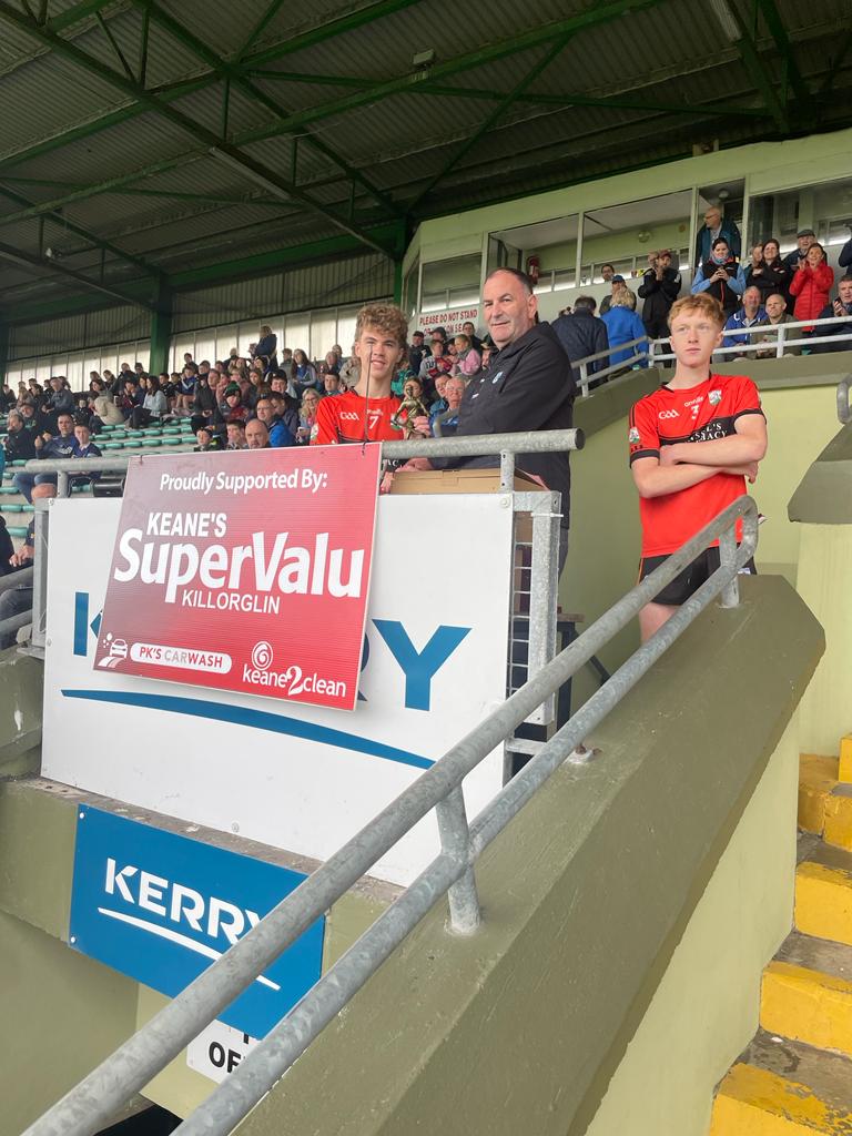 Kerry_Official's tweet photo. Kerry GAA Hurling Officer, Liam Ross, presents the Keane's SuperValu County Minor Hurling Shield to Ballyheigue captain, Donnacha Horgan, and the player-of-the-match award to Aodhan Horgan.💚💛 Congratulations @BallyheigueGAA. Commiserations to @FiriesGAA. https://t.co/CciAfK5w8A
